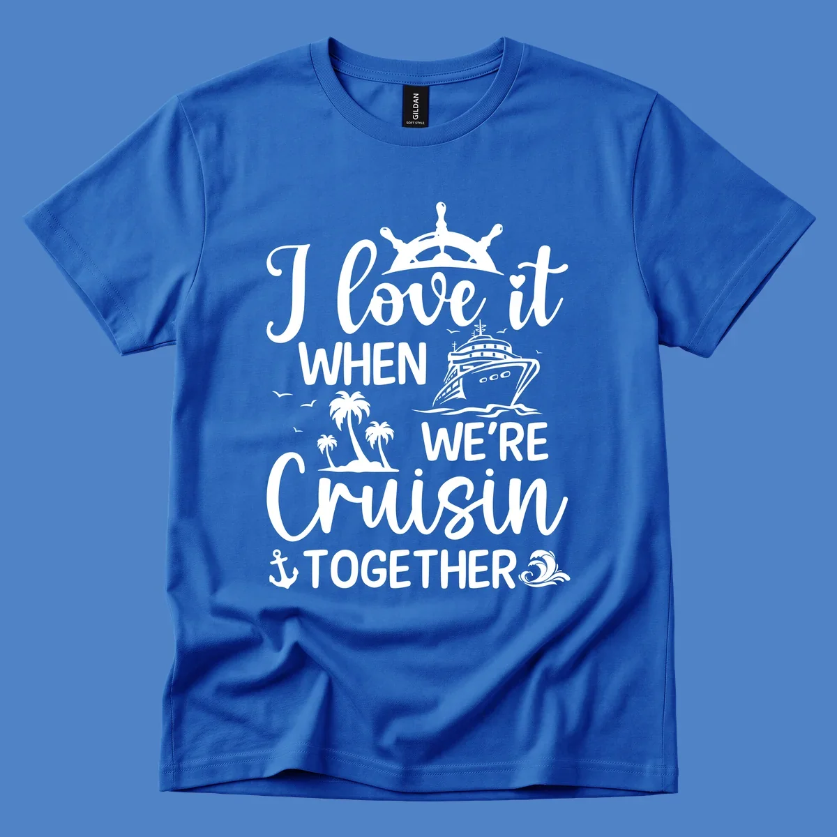 White nautical design with 'I love it when we're cruisin together' text, ship wheel, cruise ship, palm trees and anchor on gray background