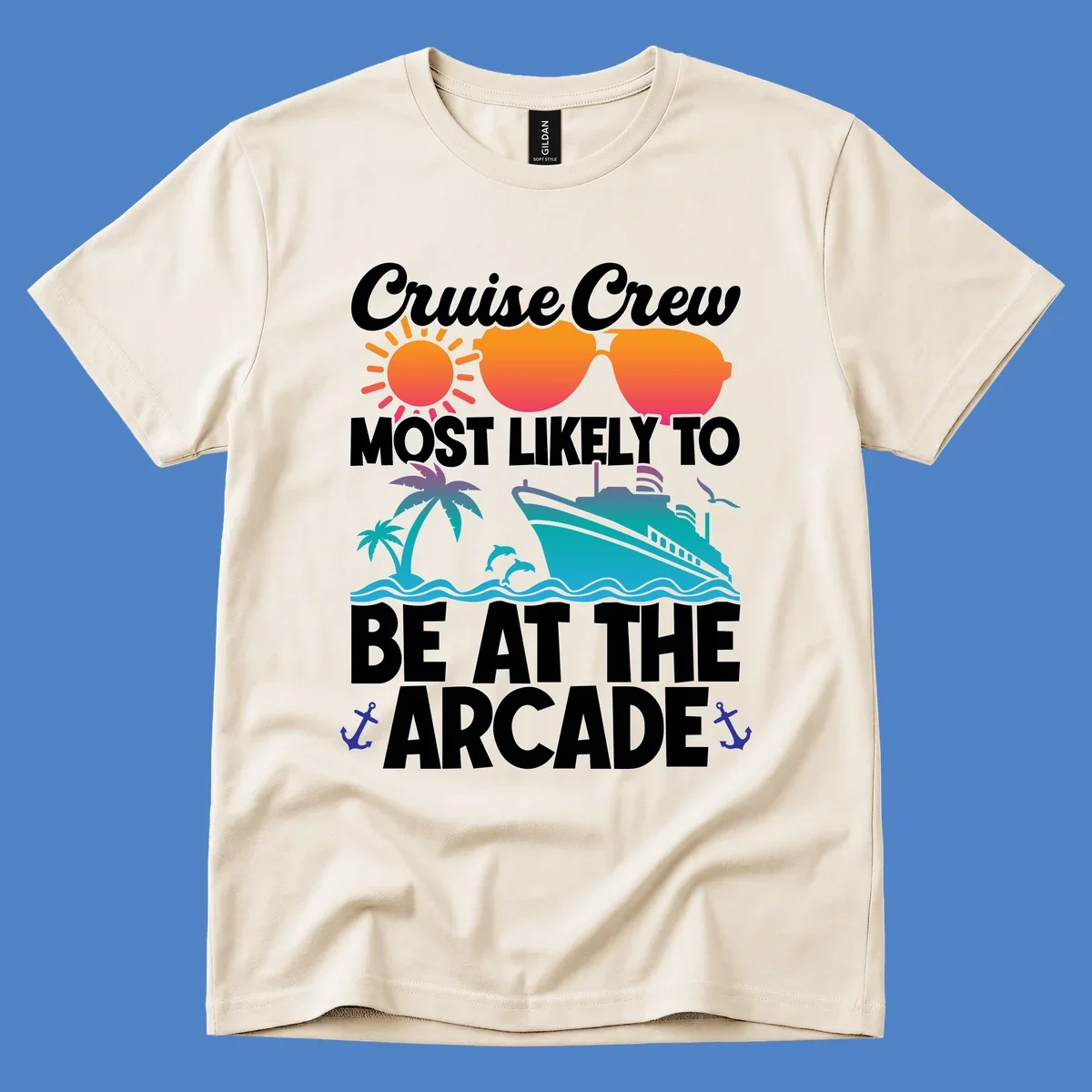 Colorful cruise-themed design with sun, sunglasses, palm tree, ship and waves. Text reads 'Cruise Crew Most Likely To Be At The Arcade' in white letters with gradient orange to teal colors and anchor accents.
