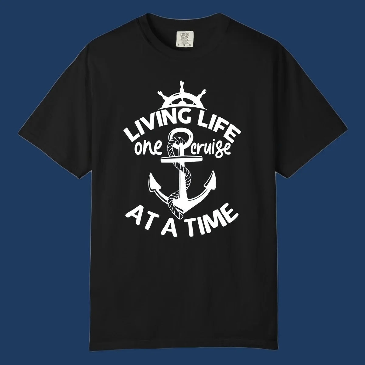 White nautical design with ship's wheel, anchor and rope on gray background with text living life one cruise at a time