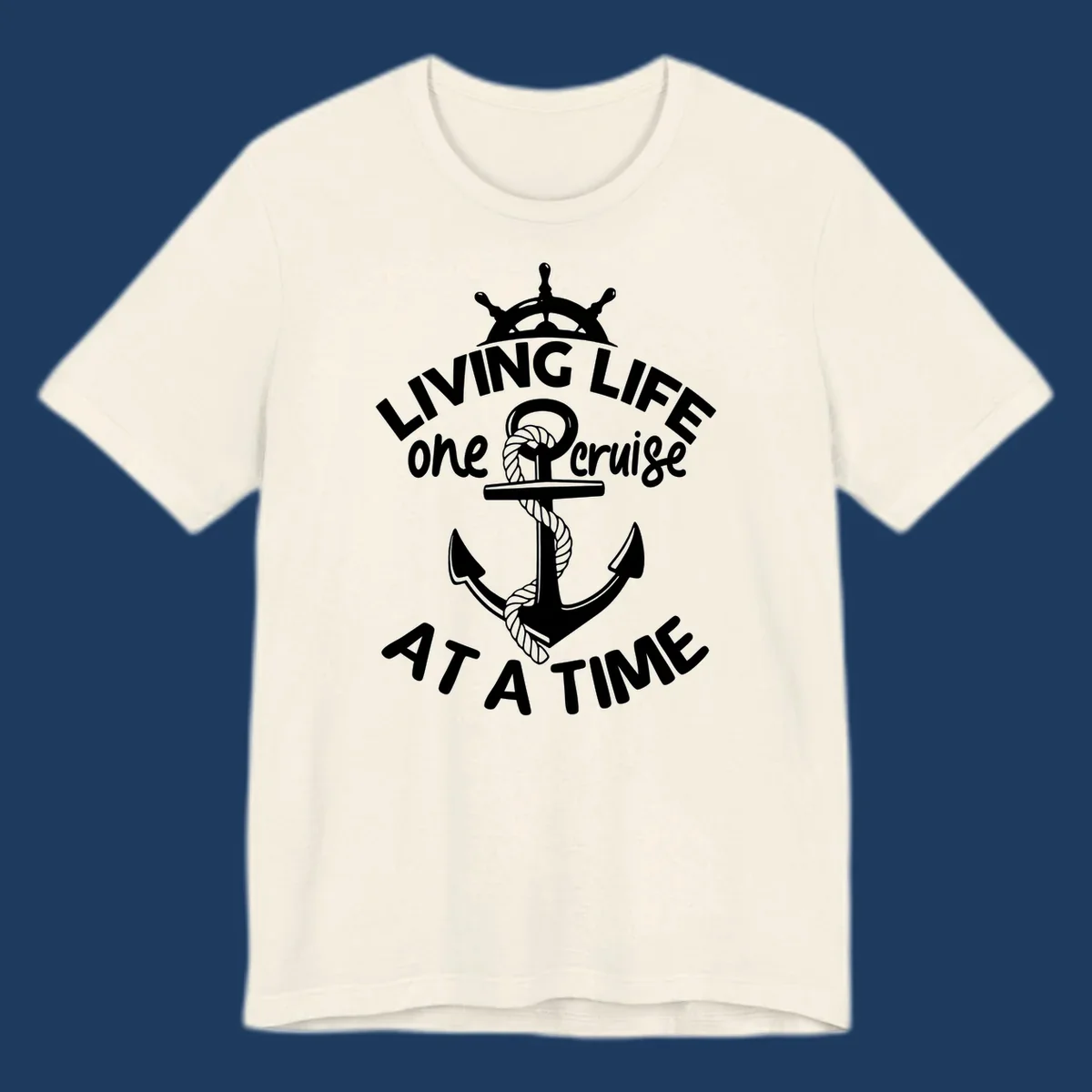 White nautical design with ship's wheel, anchor and rope on gray background with text living life one cruise at a time