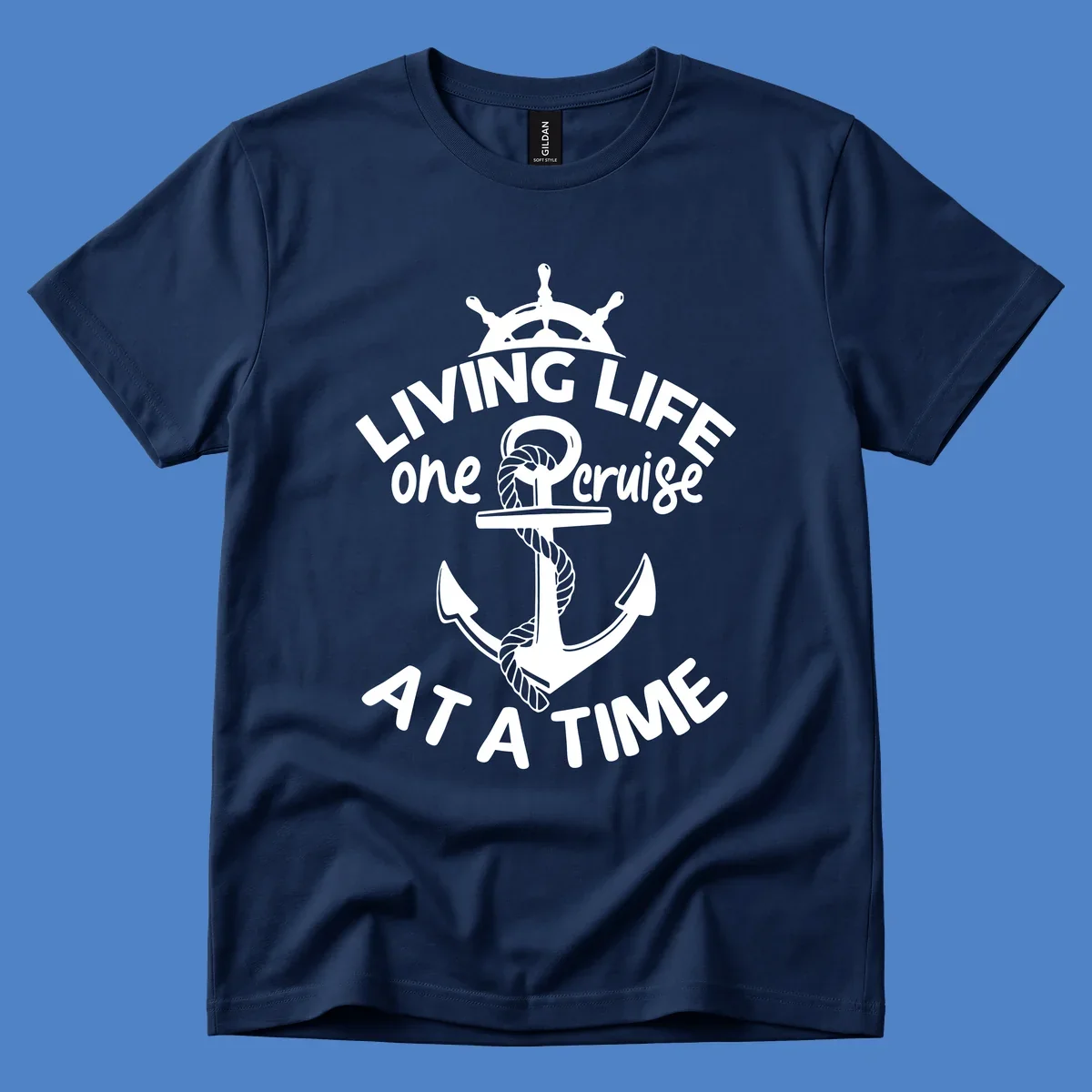 White nautical design with ship's wheel, anchor and rope on gray background with text living life one cruise at a time
