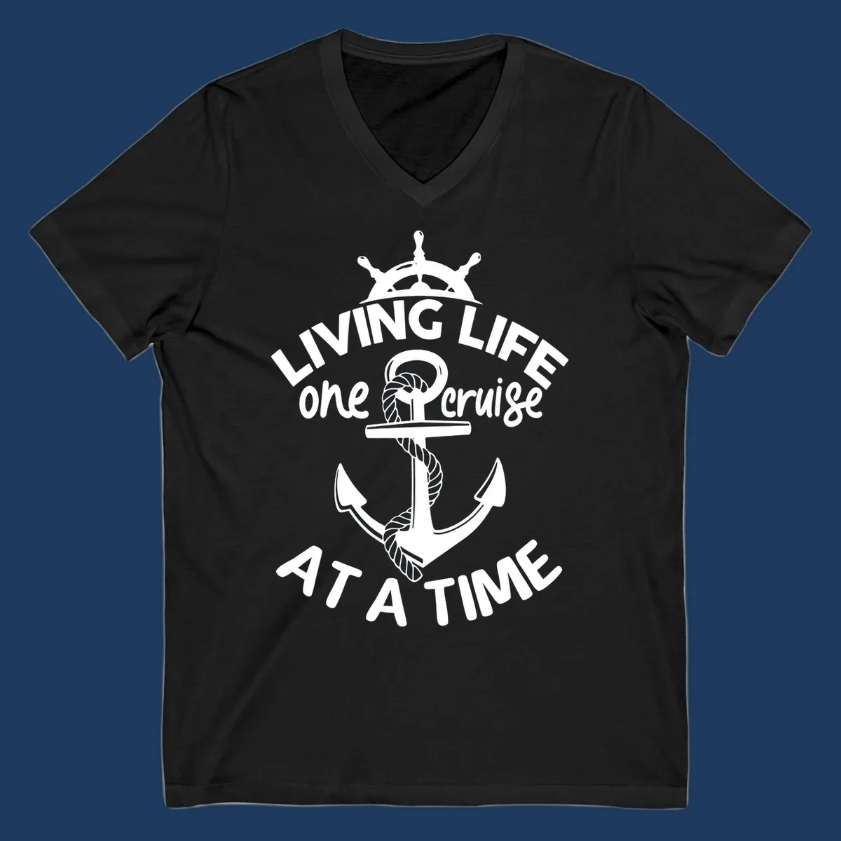 White nautical design with ship's wheel, anchor and rope on gray background with text living life one cruise at a time