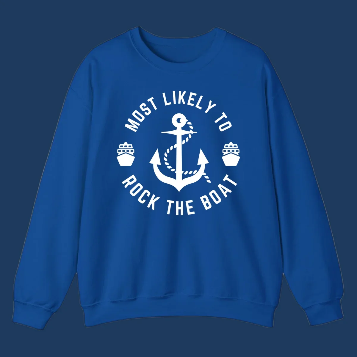 Circular badge design with anchor and rope in center, two cruise ships on sides, 'Most Likely To Rock The Boat' text in circle