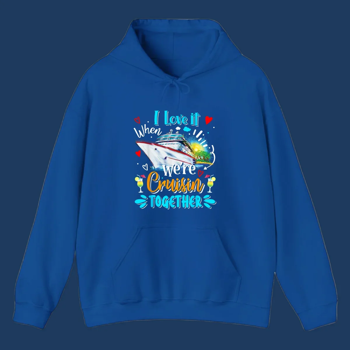 Colorful cruise ship with tropical island, hearts, and cocktails. Text reads 'I love it when we're Cruising Together' in cyan and orange lettering on gray background.