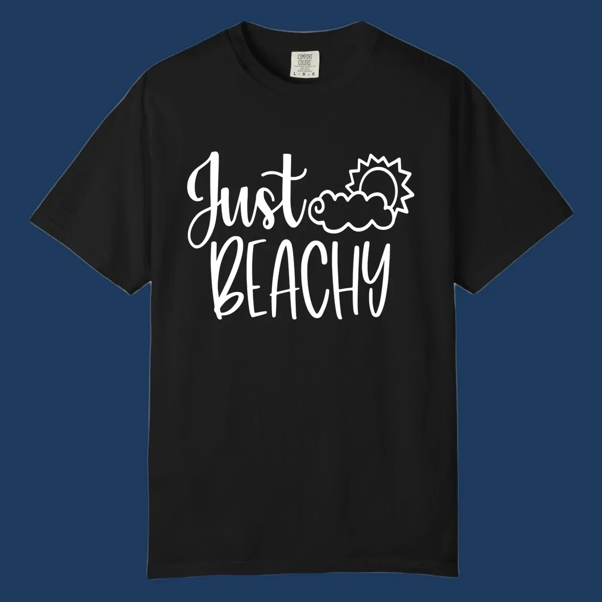 White illustrated text reading 'Just Beachy' with a smiling sun and cloud graphic, capturing beach vacation vibes