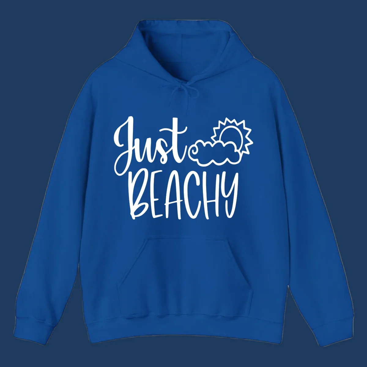 White illustrated text reading 'Just Beachy' with a smiling sun and cloud graphic, capturing beach vacation vibes