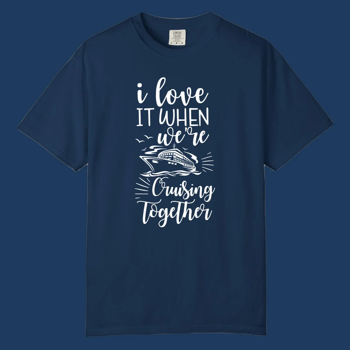 White script text reading 'i love it when we're cruising together' with an illustration of a cruise ship on ocean waves and seagulls