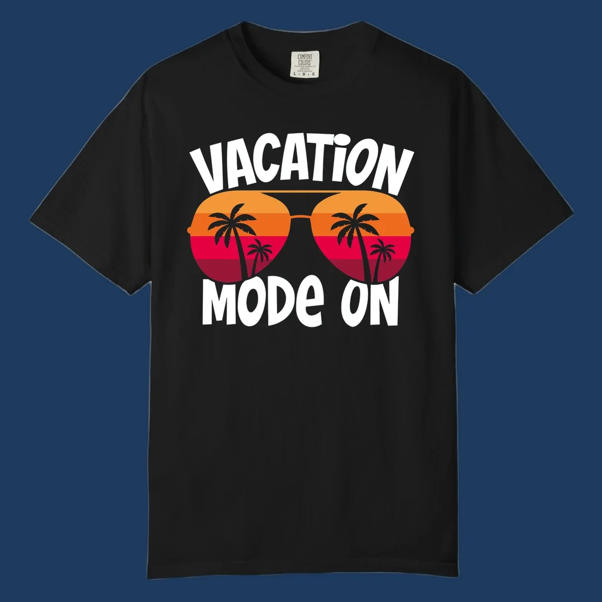 Vacation mode on design featuring oversized sunglasses with tropical sunset and palm trees inside each lens, framed by bold white text