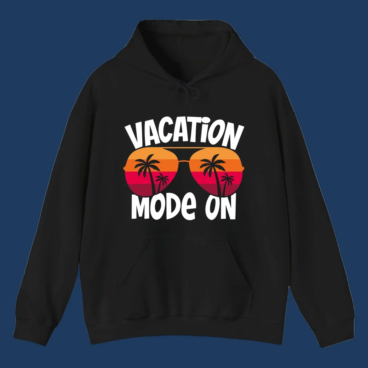 Vacation mode on design featuring oversized sunglasses with tropical sunset and palm trees inside each lens, framed by bold white text