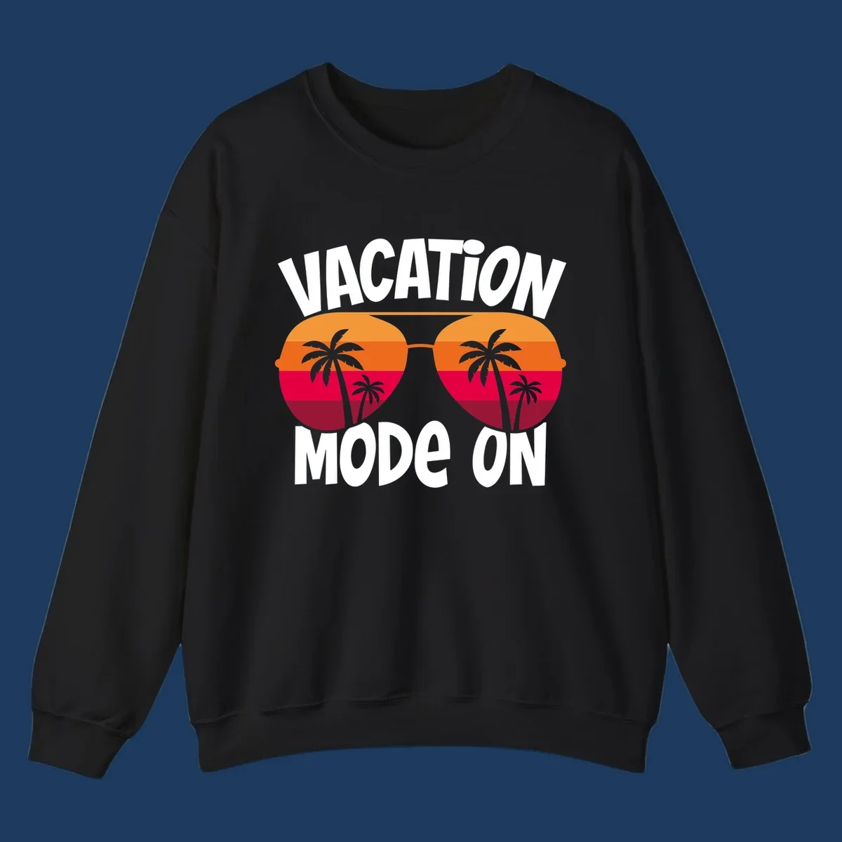 Vacation mode on design featuring oversized sunglasses with tropical sunset and palm trees inside each lens, framed by bold white text