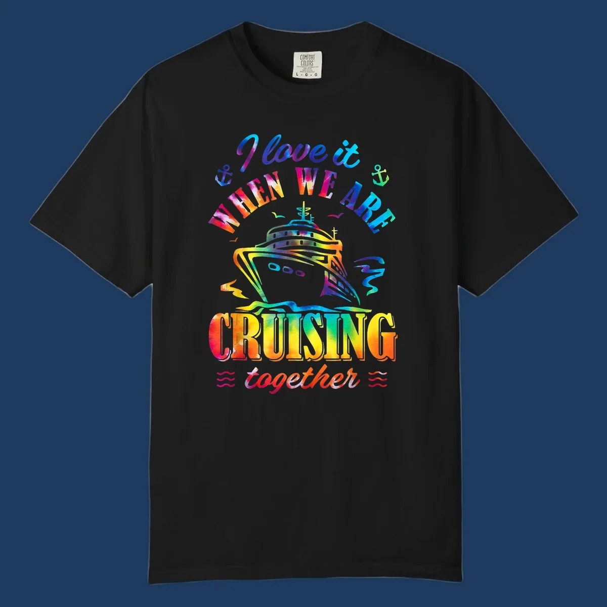 Colorful cruise ship design with 'I love it when we're cruising together' text, anchors, and waves on gray background