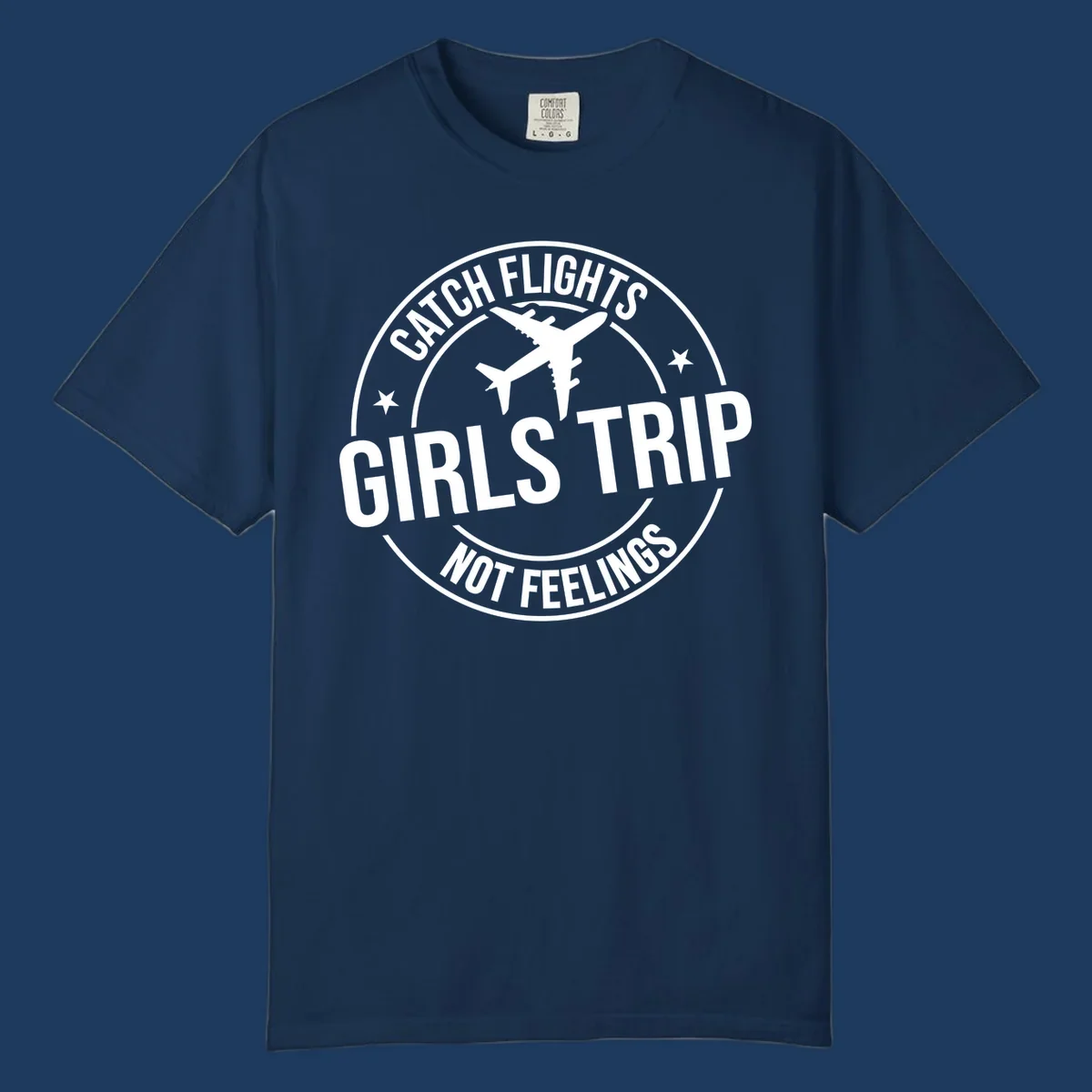Circular badge design with airplane silhouette and text reading 'Catch Flights Girls Trip Not Feelings' for cruise vacation apparel