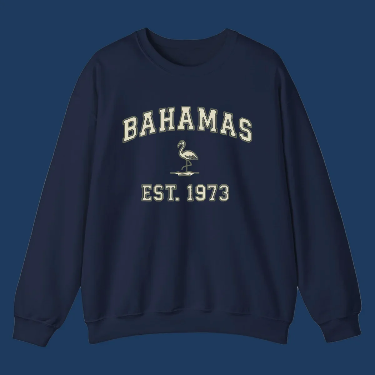 Vintage bahamas flamingo design with cream lettering and olive green outline, established 1973 theme