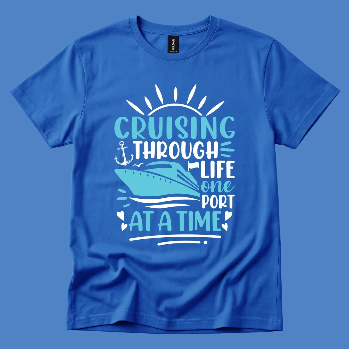 Cruise ship with anchor and sun rays design featuring text 'Cruising Through Life One Port At A Time' in turquoise and white on gray background