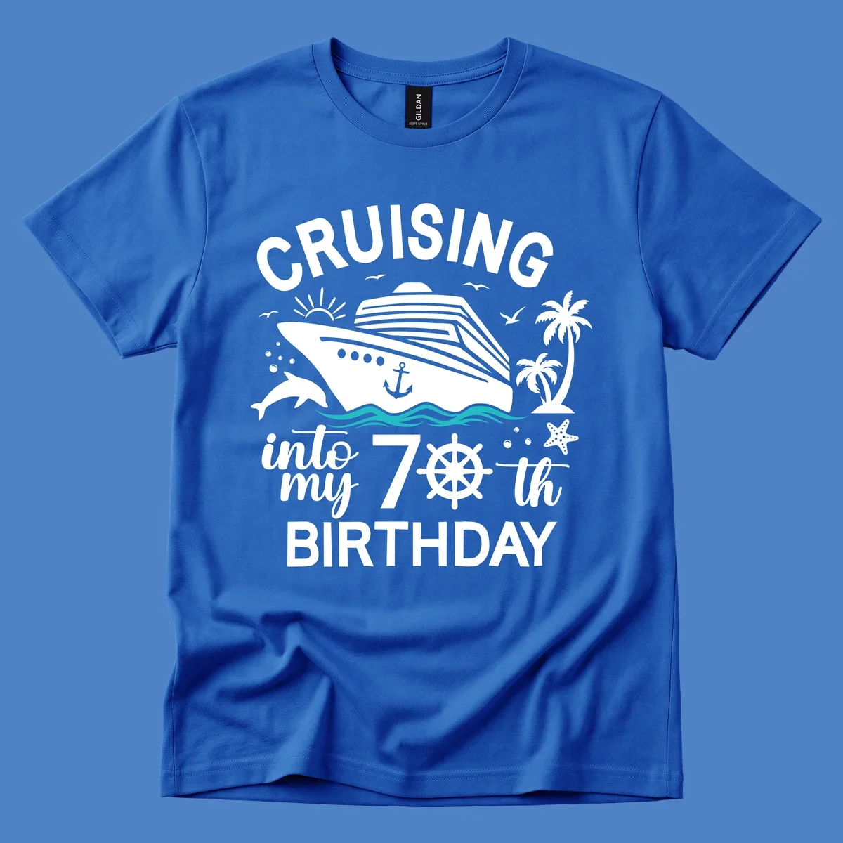 Cruise ship illustration with 'Cruising into my 70th Birthday' text, featuring dolphins, palm trees, starfish, and nautical elements on gray background