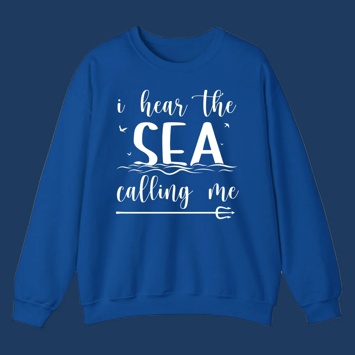 White nautical design with 'i hear the SEA calling me' text, ocean waves, seabirds, and trident anchor on gray background