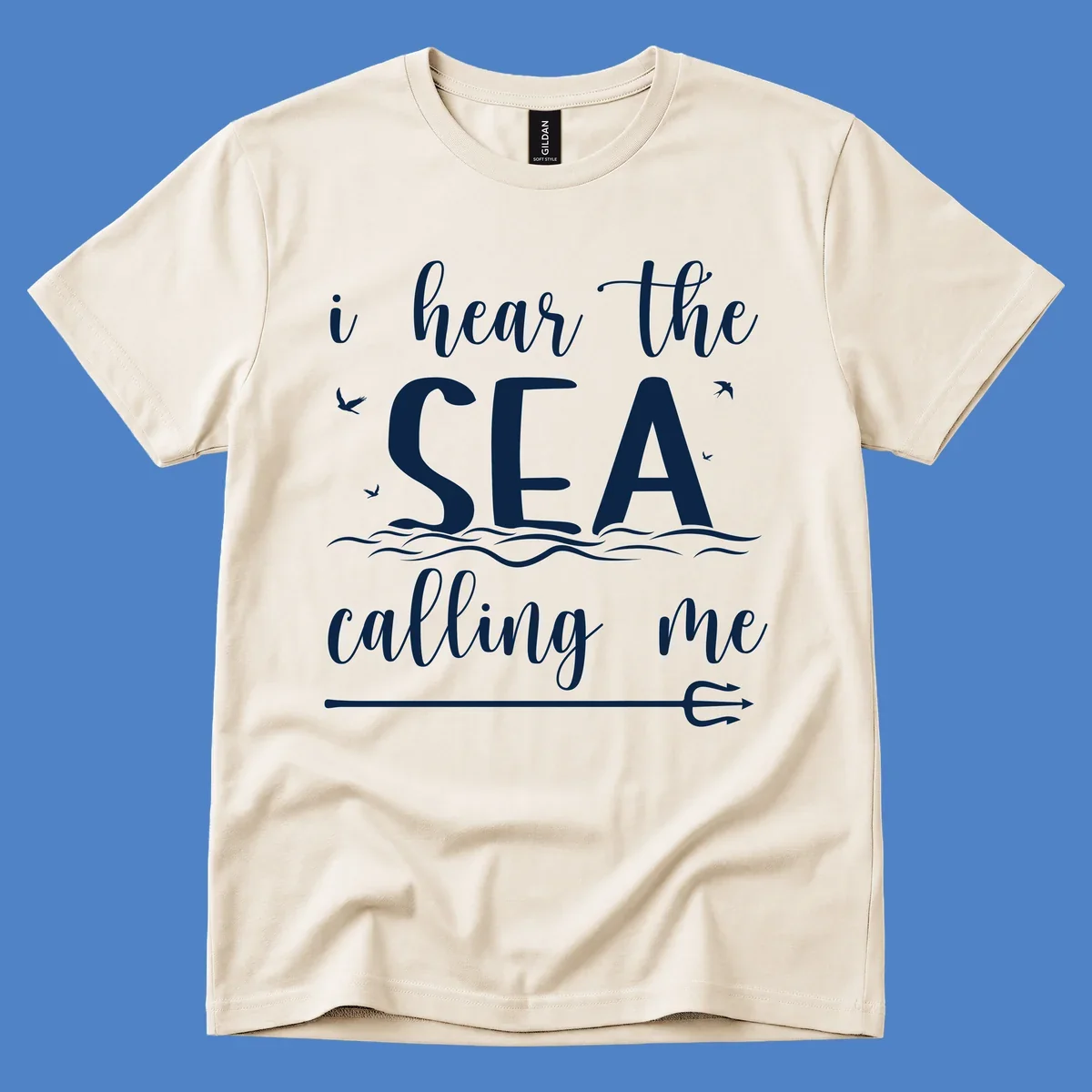 White nautical design with 'i hear the SEA calling me' text, ocean waves, seabirds, and trident anchor on gray background
