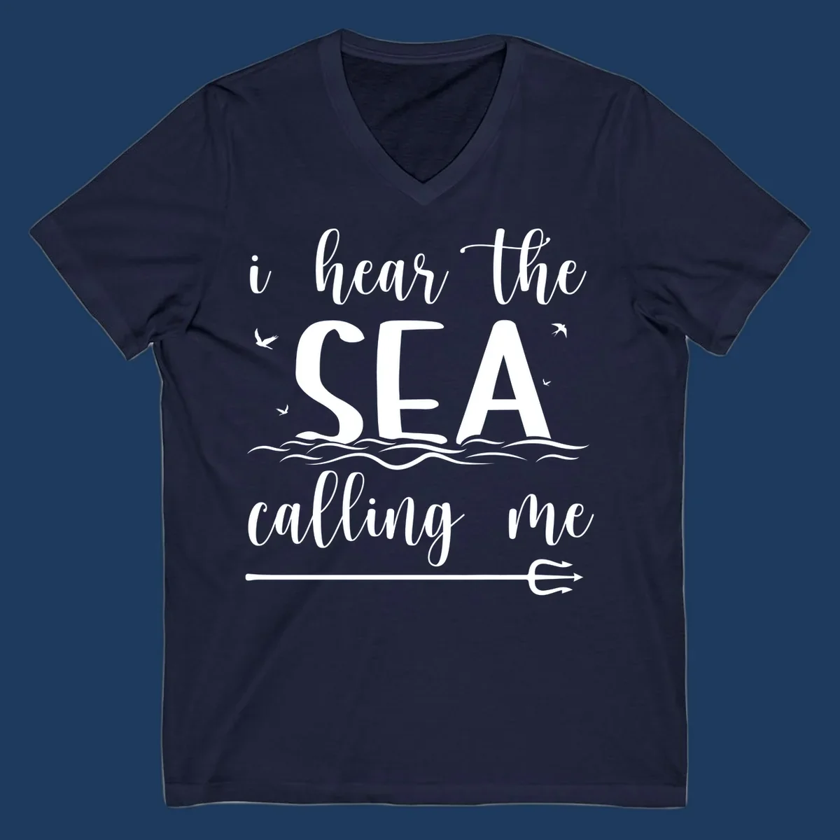 White nautical design with 'i hear the SEA calling me' text, ocean waves, seabirds, and trident anchor on gray background