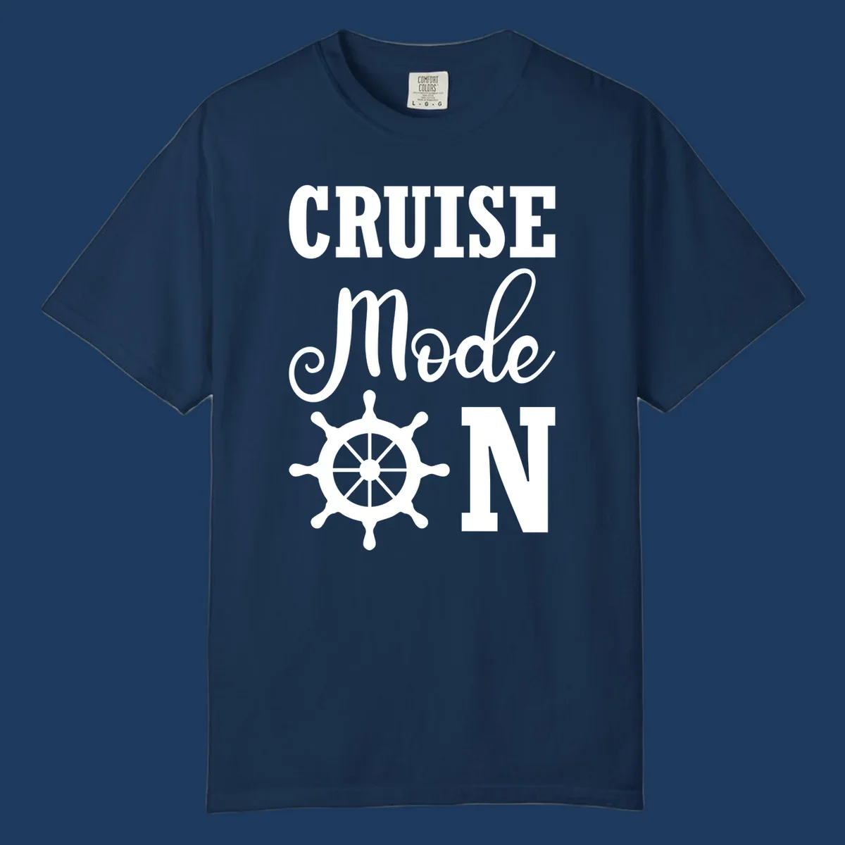 White ship wheel with cruise mode text design on gray background for nautical vacation apparel