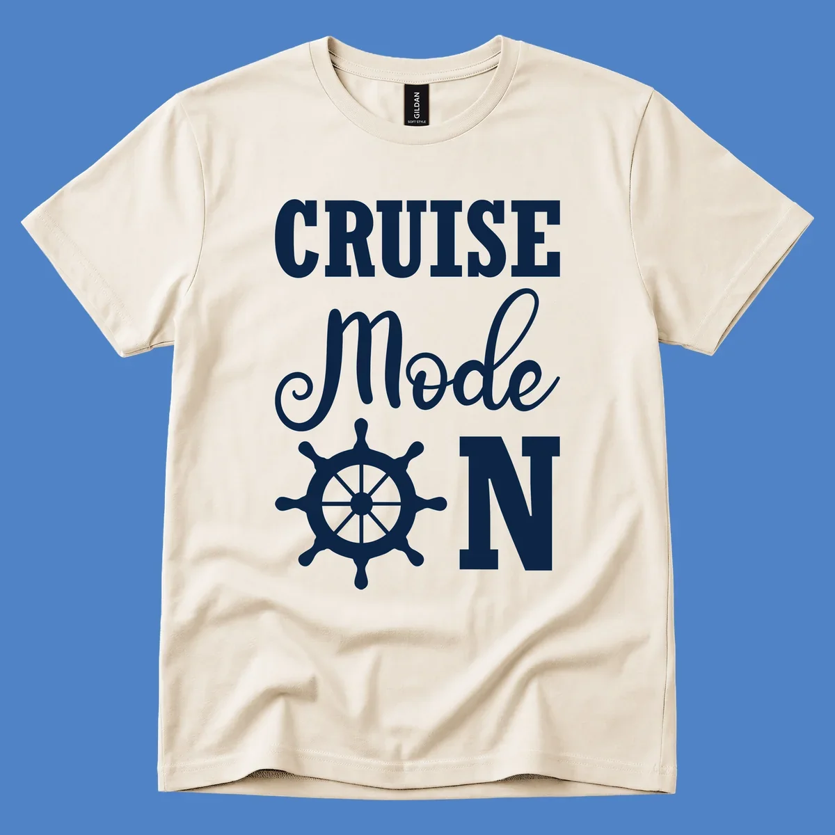 White ship wheel with cruise mode text design on gray background for nautical vacation apparel