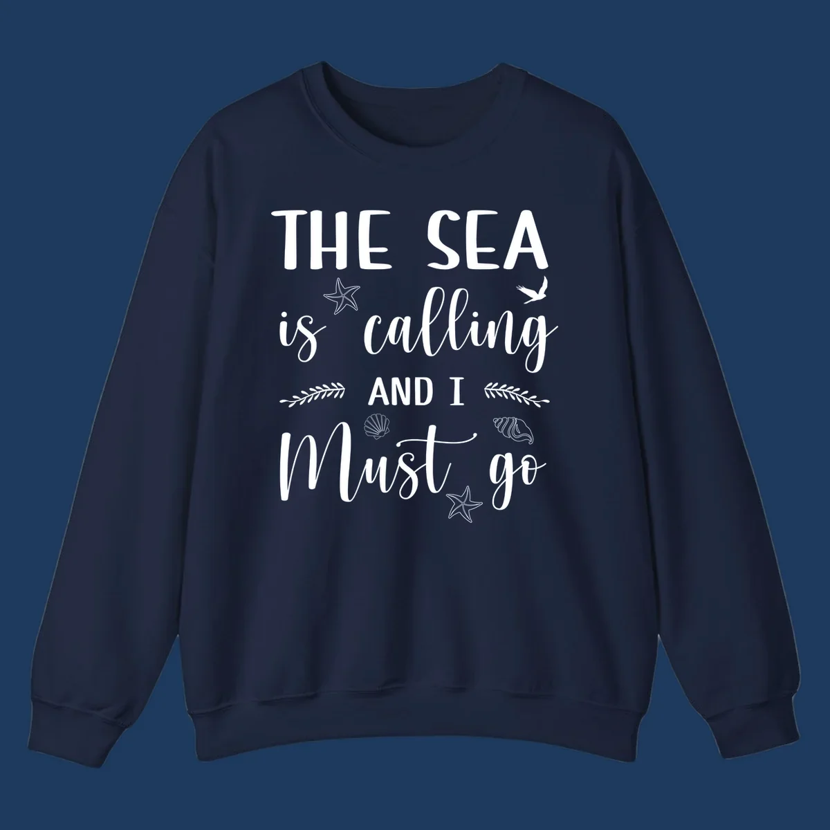 Gray design with white text reading 'The Sea is calling and I must go' surrounded by starfish, seashells, seaweed, and seabird illustrations