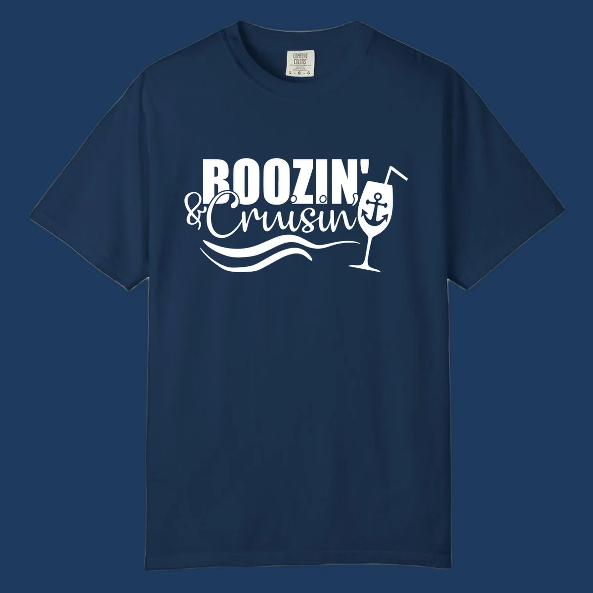 Boozin' & Cruising nautical design with anchor, wine glass, and ocean waves on gray background