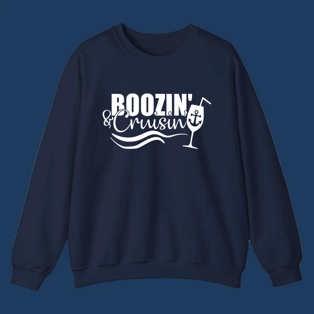 Boozin' & Cruising nautical design with anchor, wine glass, and ocean waves on gray background