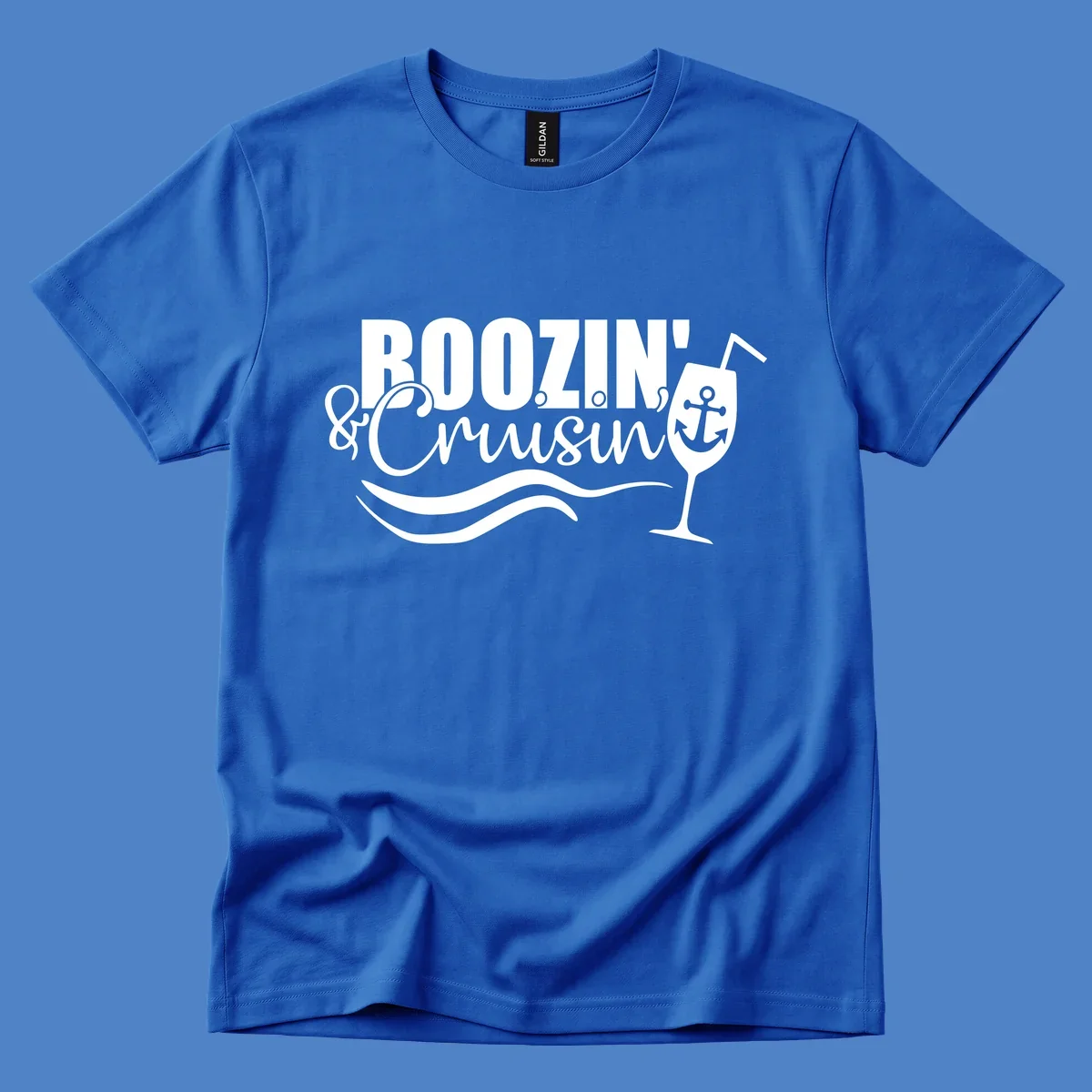 Boozin' & Cruising nautical design with anchor, wine glass, and ocean waves on gray background