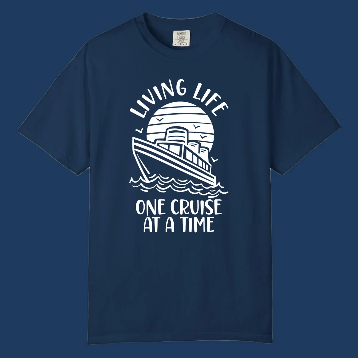 Line art illustration of a cruise ship on ocean waves with sunset, text reading 'Living Life One Cruise At A Time'