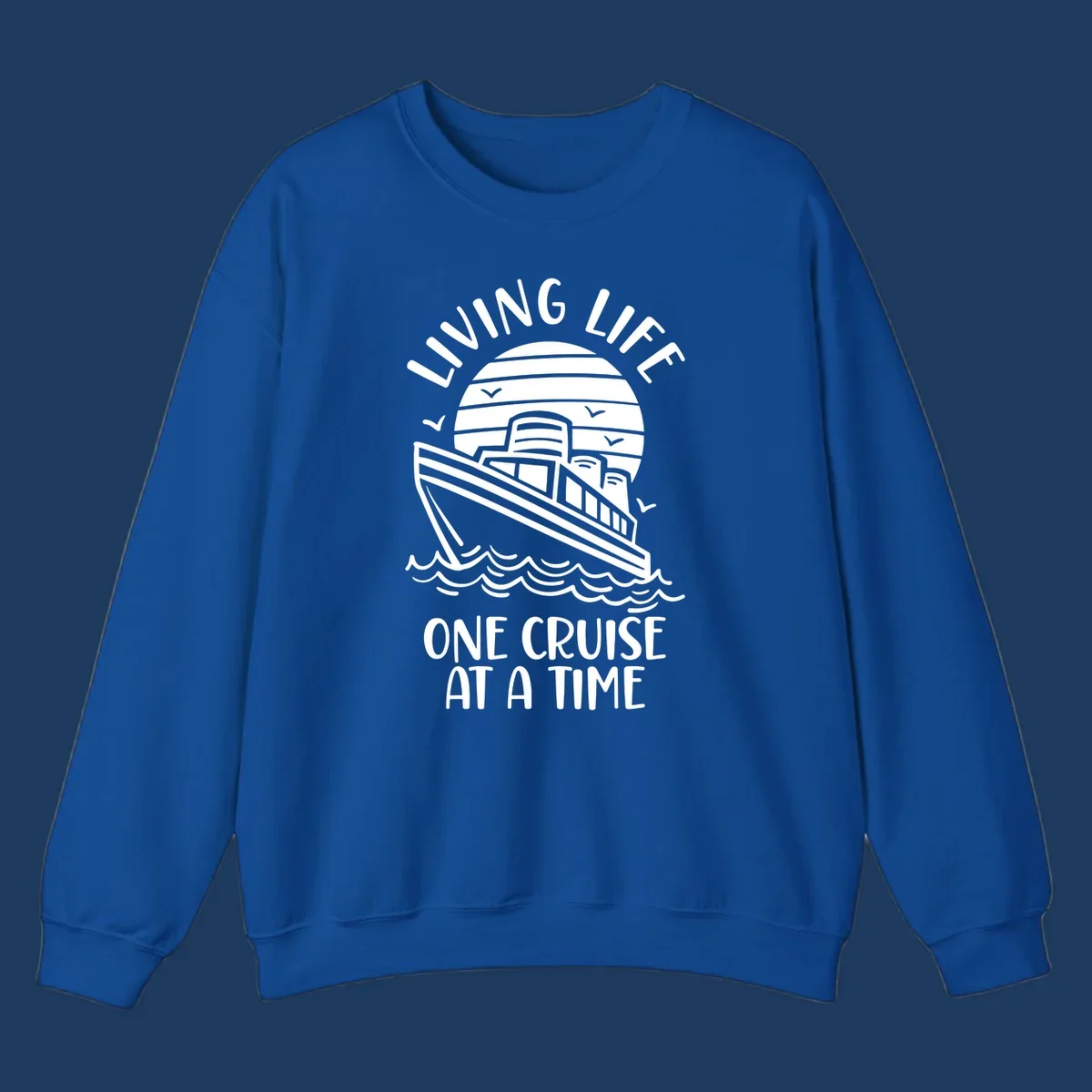 Line art illustration of a cruise ship on ocean waves with sunset, text reading 'Living Life One Cruise At A Time'