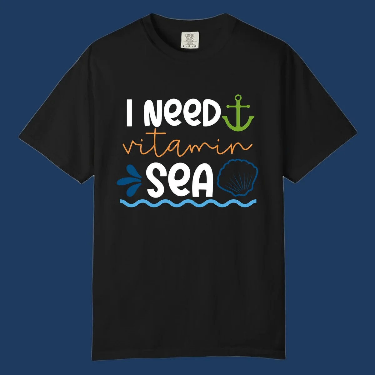 Nautical design with white text reading 'I Need Vitamin Sea' surrounded by anchor, shells, waves, and water droplets in orange, green, and blue