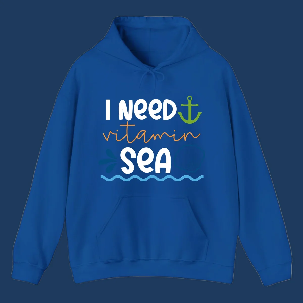 Nautical design with white text reading 'I Need Vitamin Sea' surrounded by anchor, shells, waves, and water droplets in orange, green, and blue