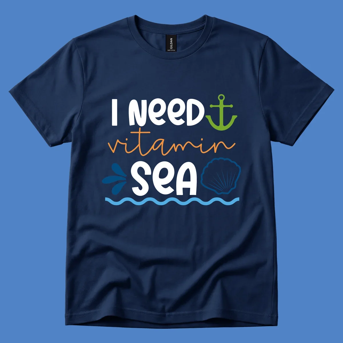 Nautical design with white text reading 'I Need Vitamin Sea' surrounded by anchor, shells, waves, and water droplets in orange, green, and blue