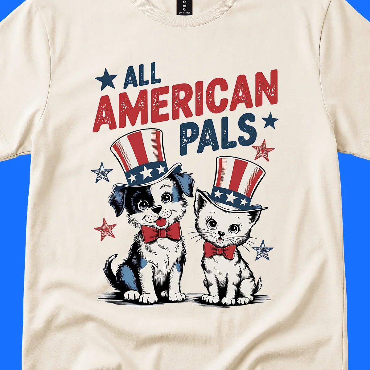Illustration of a puppy and kitten wearing Uncle Sam hats and bow ties, with the text 'ALL AMERICAN PALS' and stars. A patriotic all-american-pals design.
