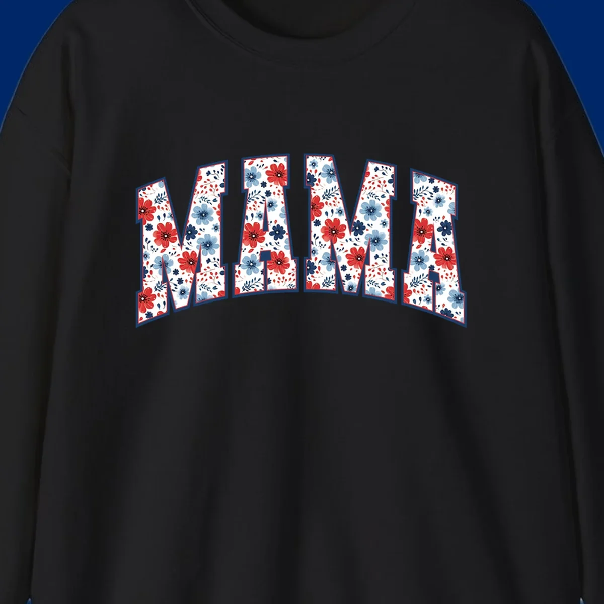 The word MAMA spelled out in large letters, filled with a patriotic floral design of red and blue flowers and leaves, outlined in navy. This mama-patriotic-floral-design celebrates American heritage.