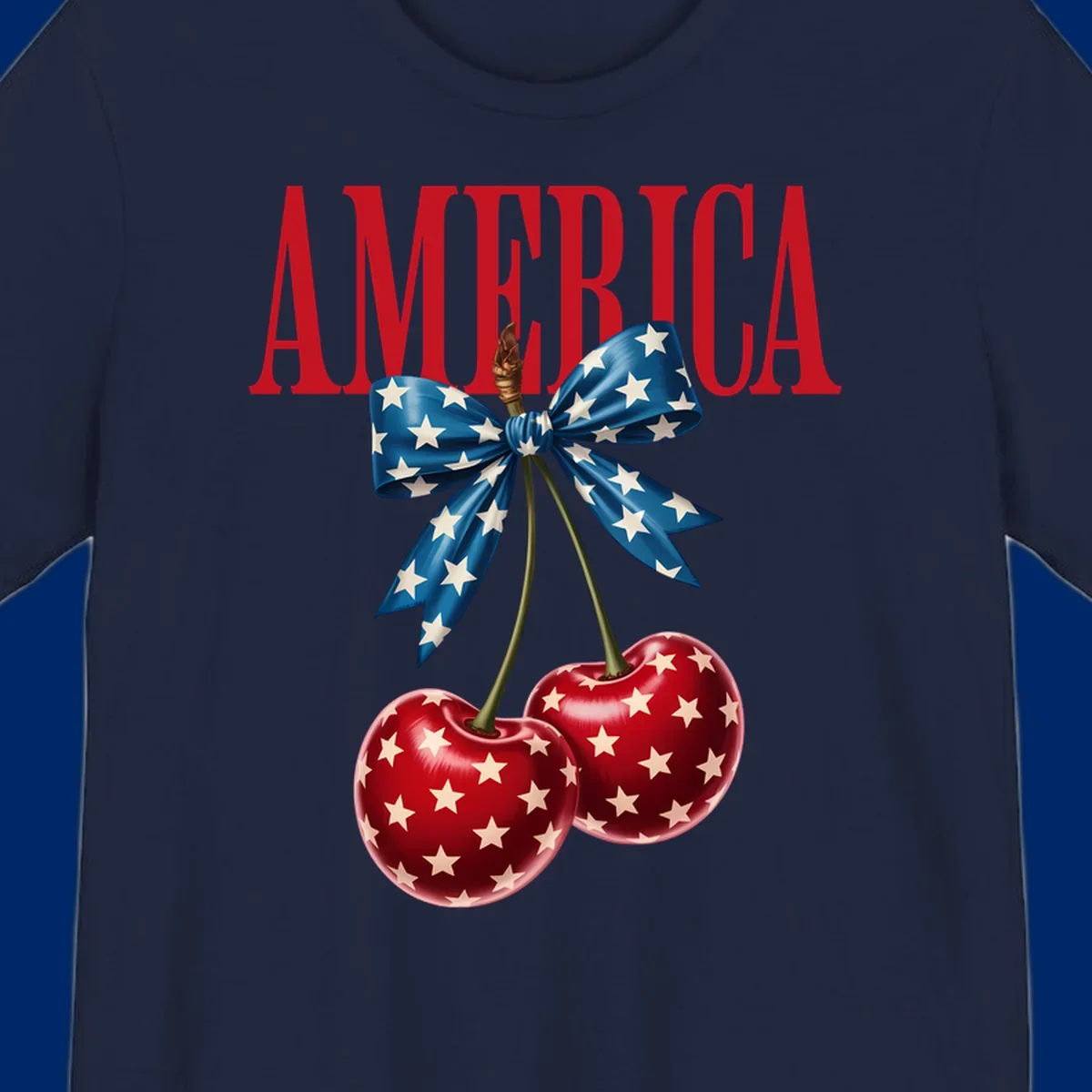 The word AMERICA in red above two red, white, and blue star-spangled cherries tied with a star bow. Features america-patriotic-cherries.