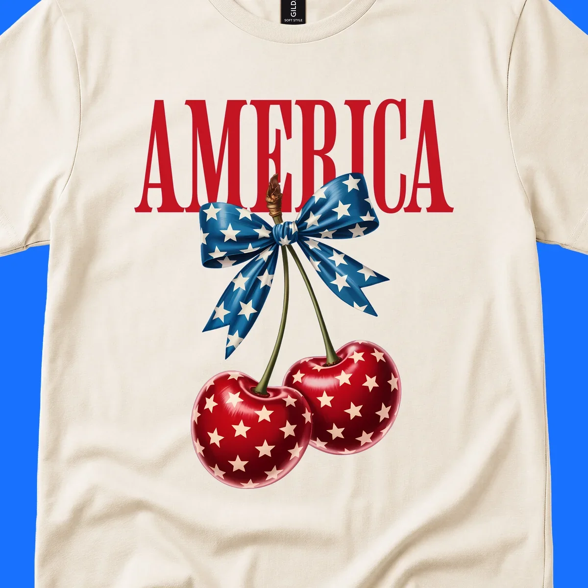 The word AMERICA in red above two red, white, and blue star-spangled cherries tied with a star bow. Features america-patriotic-cherries.