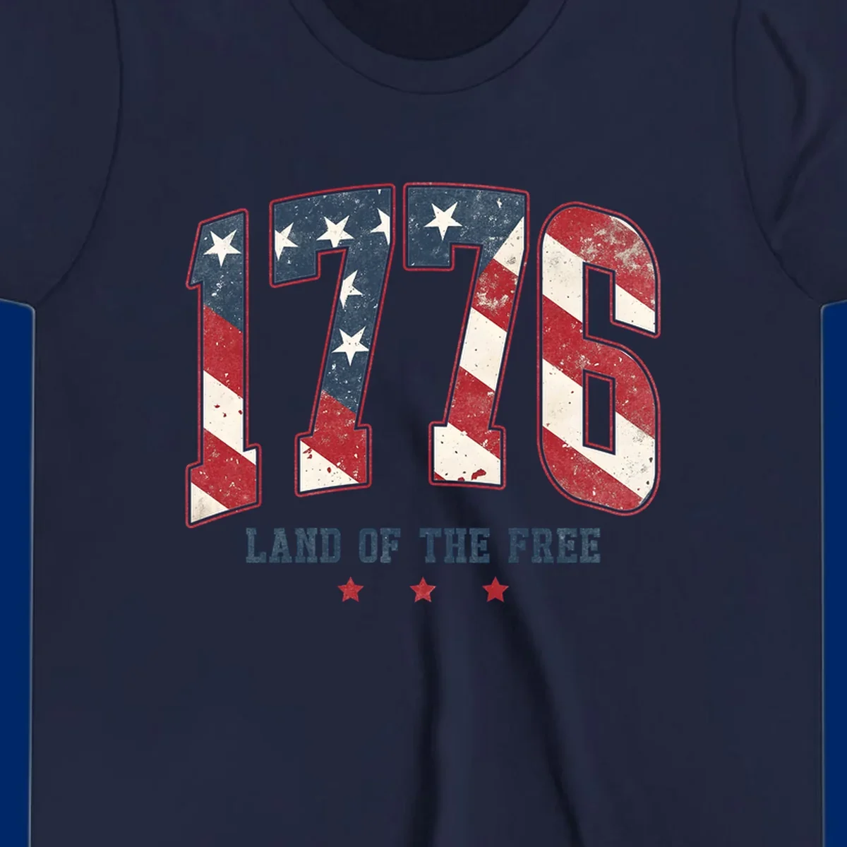 Vintage distressed design featuring the number 1776 in American flag colors and 'LAND OF THE FREE' text, celebrating America's history.