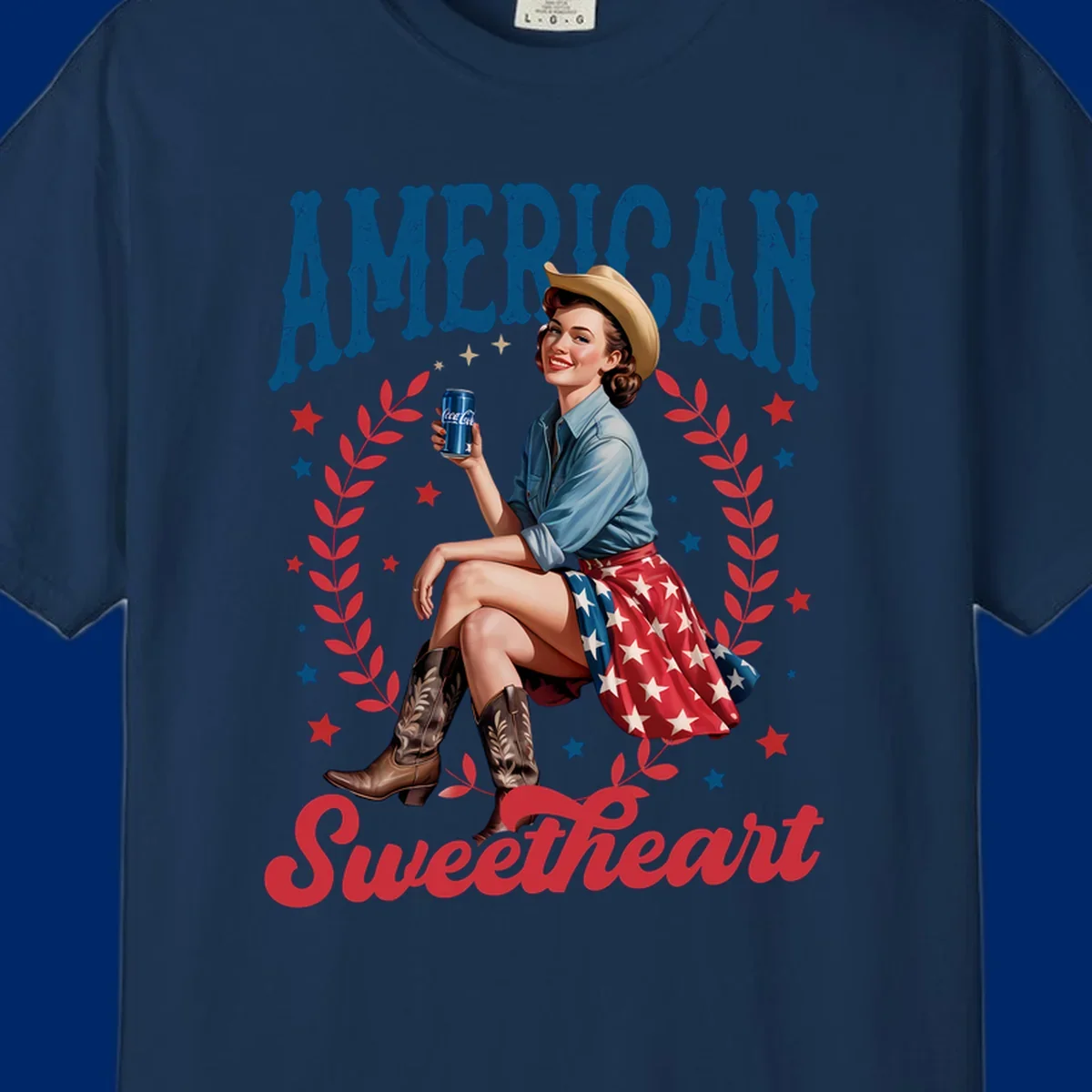 A vintage American sweetheart pin-up girl wearing a cowboy hat and American flag skirt, holding a Coca-Cola can, framed by leaves and stars, with 'AMERICAN Sweetheart' text. This american-sweetheart-pin-up design is perfect for celebrating.