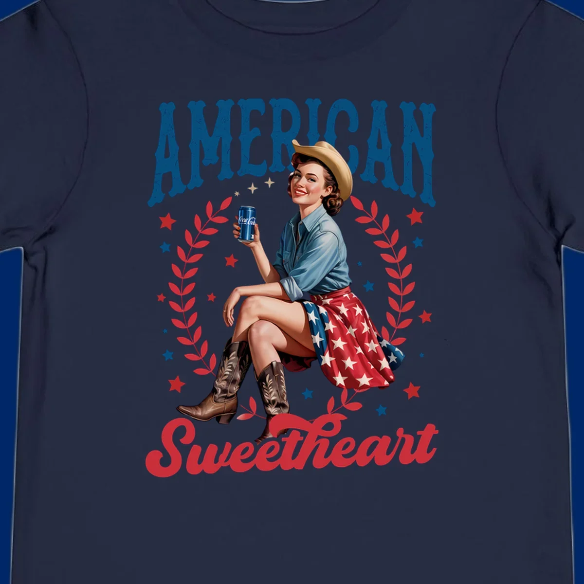 A vintage American sweetheart pin-up girl wearing a cowboy hat and American flag skirt, holding a Coca-Cola can, framed by leaves and stars, with 'AMERICAN Sweetheart' text. This american-sweetheart-pin-up design is perfect for celebrating.