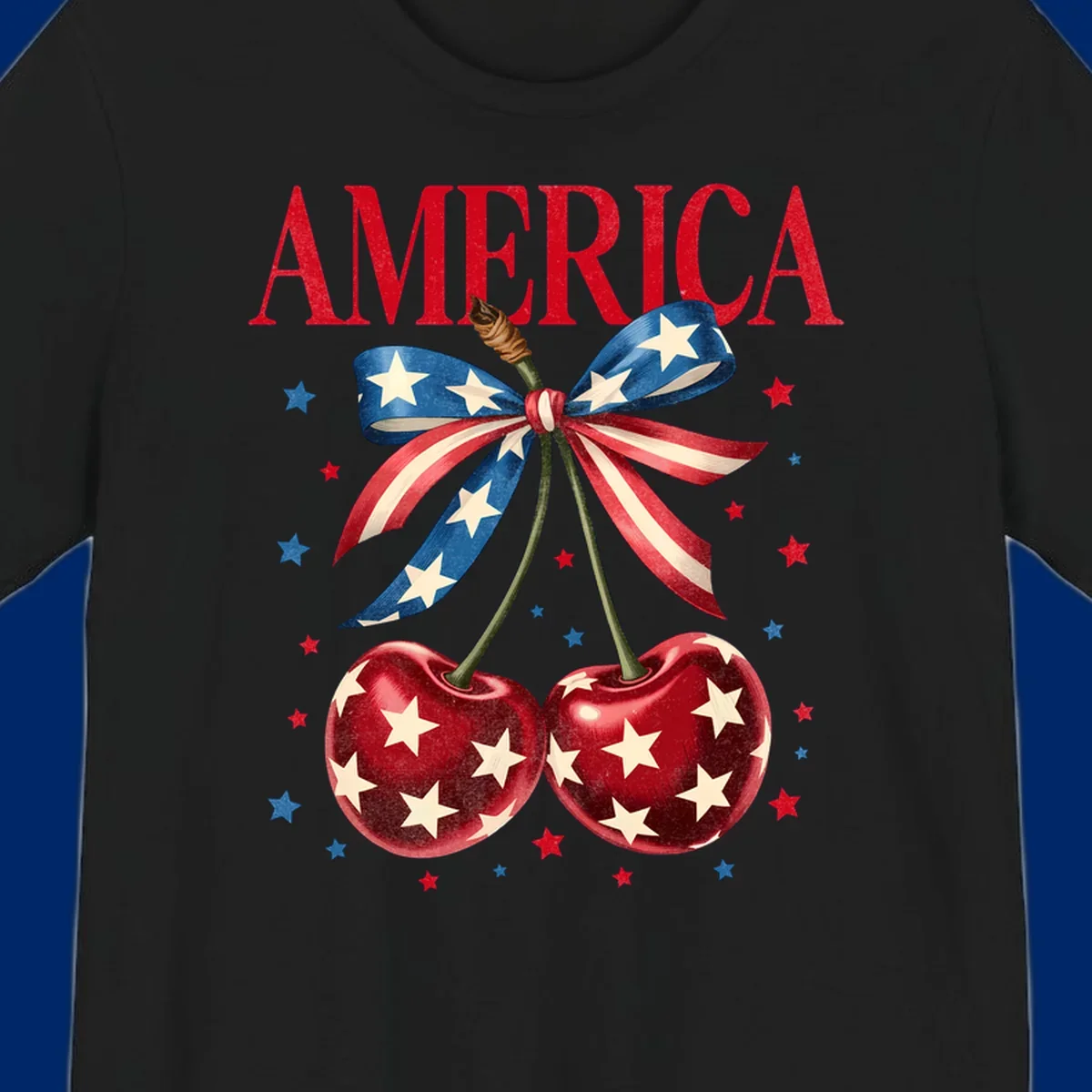 Vintage patriotic artwork featuring red 'AMERICA' text, two red cherries with white stars, and an American flag ribbon. Scattered red and blue stars complete this America-cherries-stars design.
