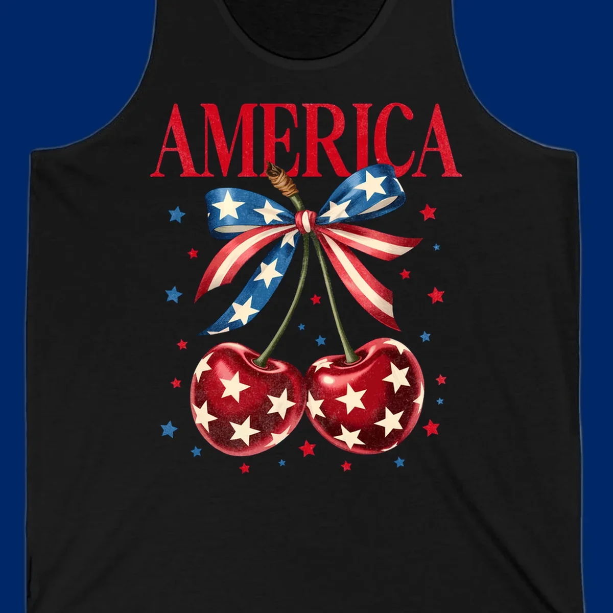 Vintage patriotic artwork featuring red 'AMERICA' text, two red cherries with white stars, and an American flag ribbon. Scattered red and blue stars complete this America-cherries-stars design.