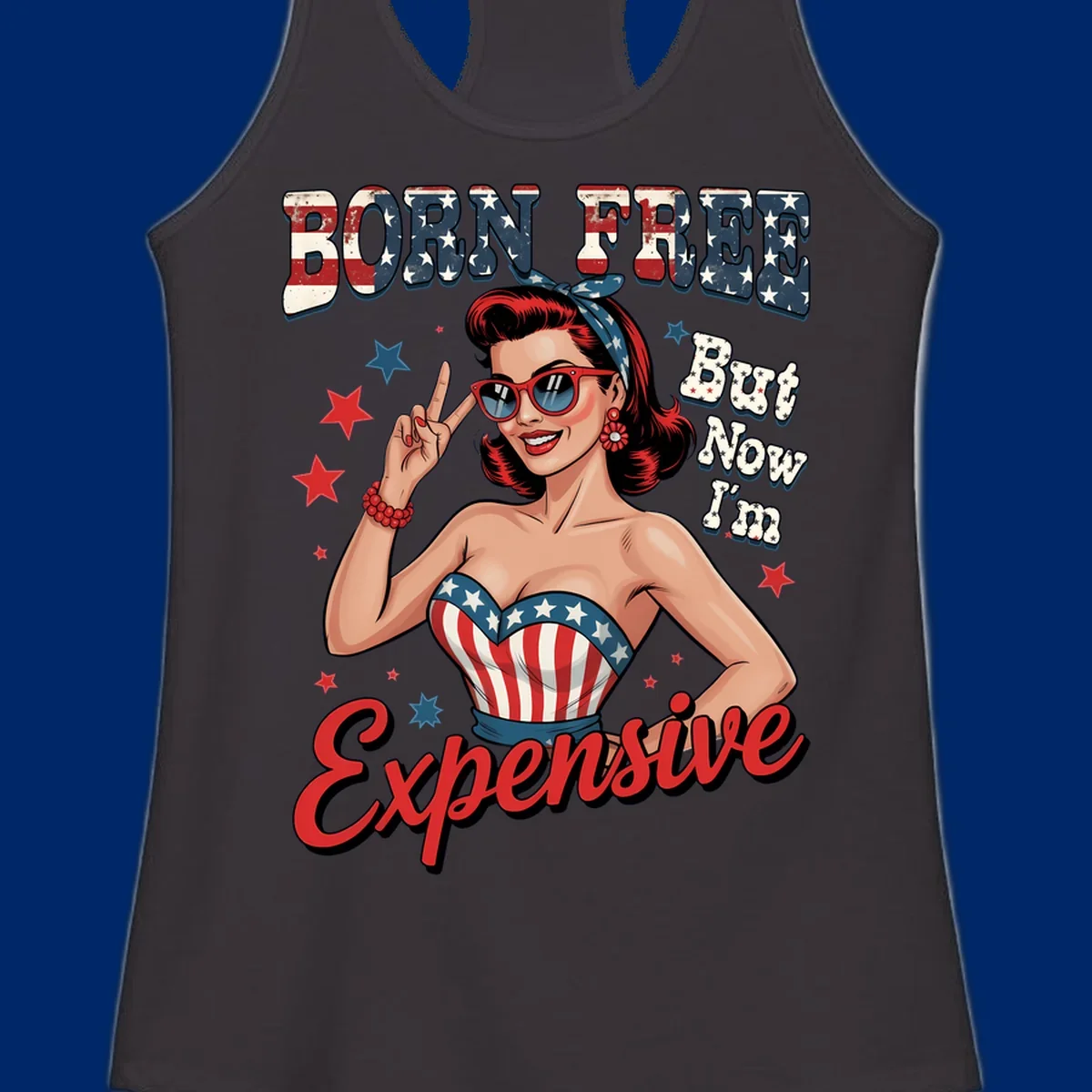 Retro pin-up girl making a peace sign, wearing a stars and stripes top, with the text 'BORN FREE But Now I'm Expensive'. This born-free-expensive-pin-up design is patriotic and fun.