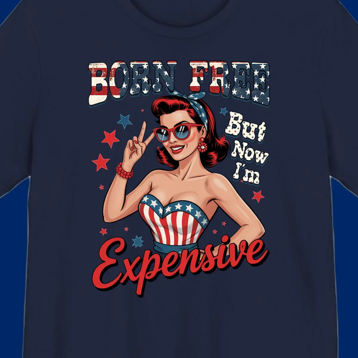 Retro pin-up girl making a peace sign, wearing a stars and stripes top, with the text 'BORN FREE But Now I'm Expensive'. This born-free-expensive-pin-up design is patriotic and fun.