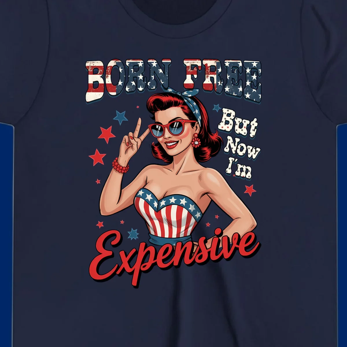Retro pin-up girl making a peace sign, wearing a stars and stripes top, with the text 'BORN FREE But Now I'm Expensive'. This born-free-expensive-pin-up design is patriotic and fun.