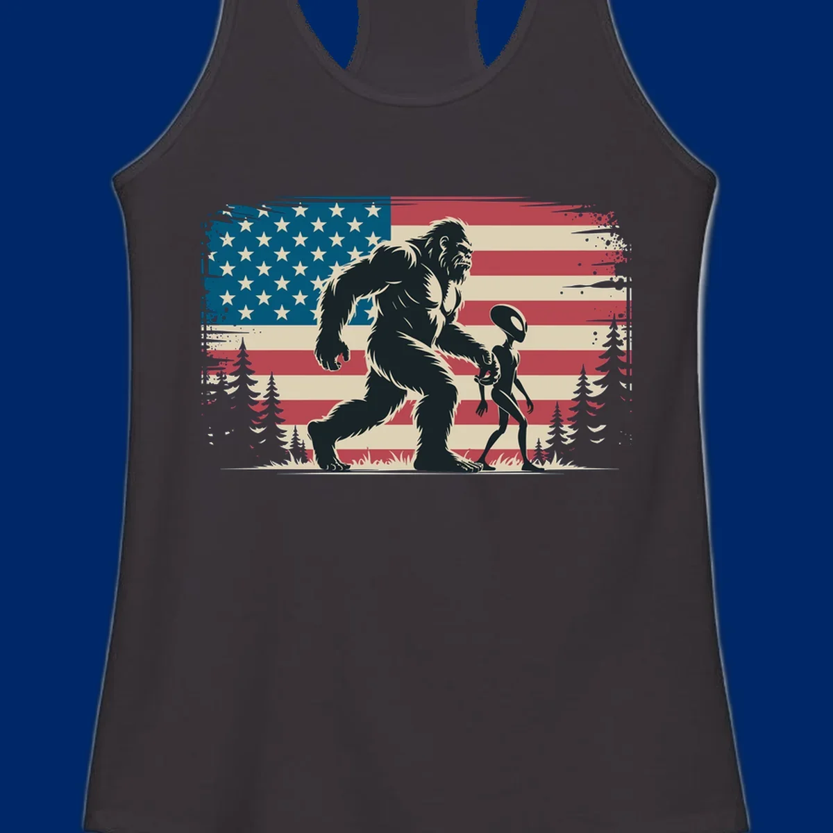 A vintage illustration of Bigfoot and a grey alien walking through a forest, set against a distressed bigfoot-alien-american-flag.