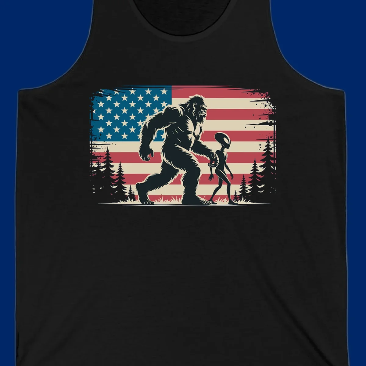 A vintage illustration of Bigfoot and a grey alien walking through a forest, set against a distressed bigfoot-alien-american-flag.