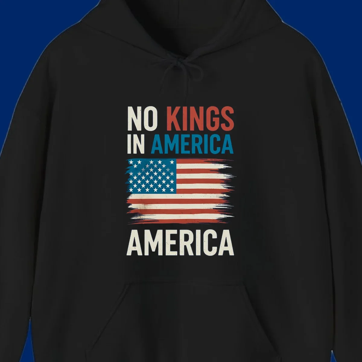 Distressed American flag design with the text 'NO KINGS IN AMERICA' above and 'AMERICA' below, representing the no-kings-in-america-flag concept.