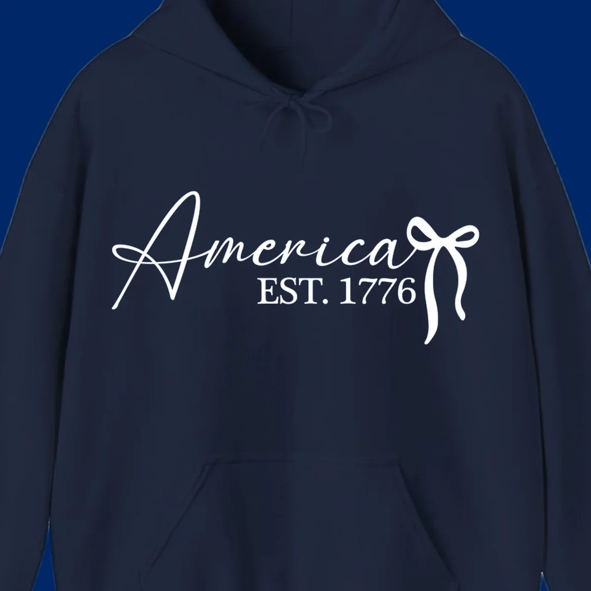 White script text "America" with decorative flourishes above "EST. 1776" in serif font, on a black background. Design for america-est-1776.