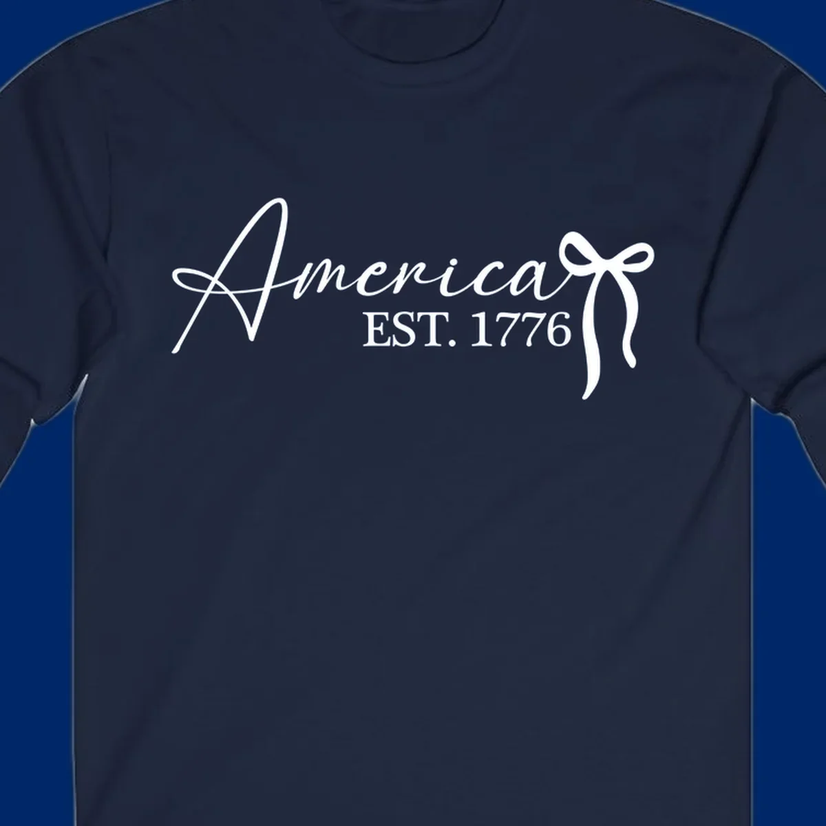 White script text "America" with decorative flourishes above "EST. 1776" in serif font, on a black background. Design for america-est-1776.